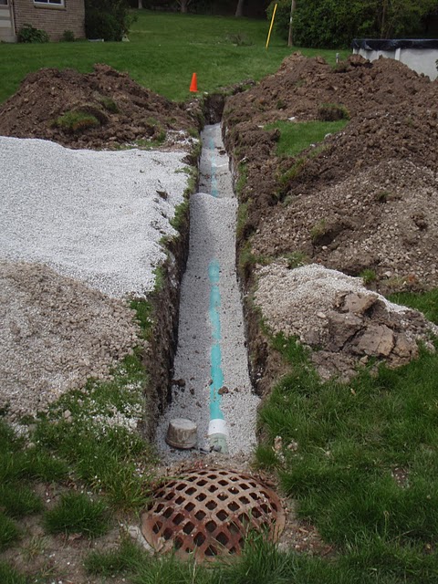 To properly reinforce the PVC Bob's Grading uses 4" of stone beneath and 12" on top. - Bob's Grading Milwaukee