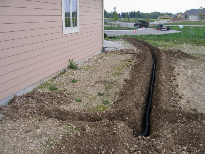 Trenching is a very effective way of solving drainage issues. - Bob's Grading Milwaukee